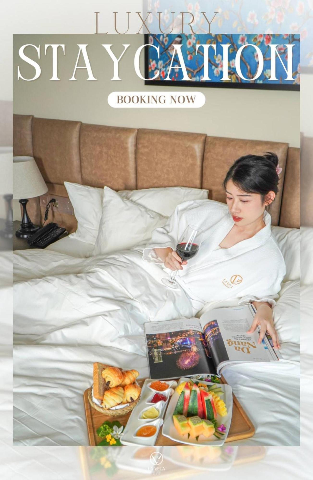 La Vela Hue Hotel מראה חיצוני תמונה A woman wearing a bathrobe